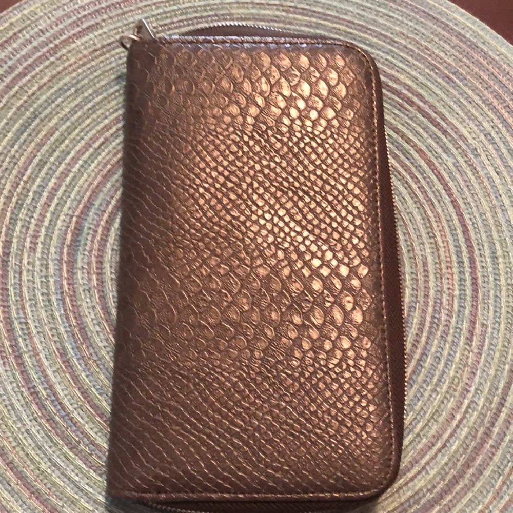 All About Benjamin’s Thirty-one wallet